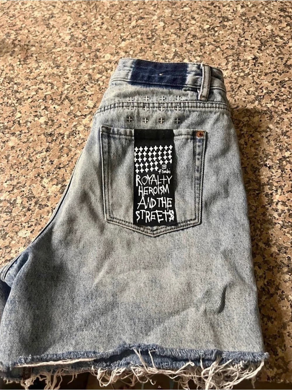 Ksubi Light Blue Denim Cutoff Shorts with Branded Waist Label